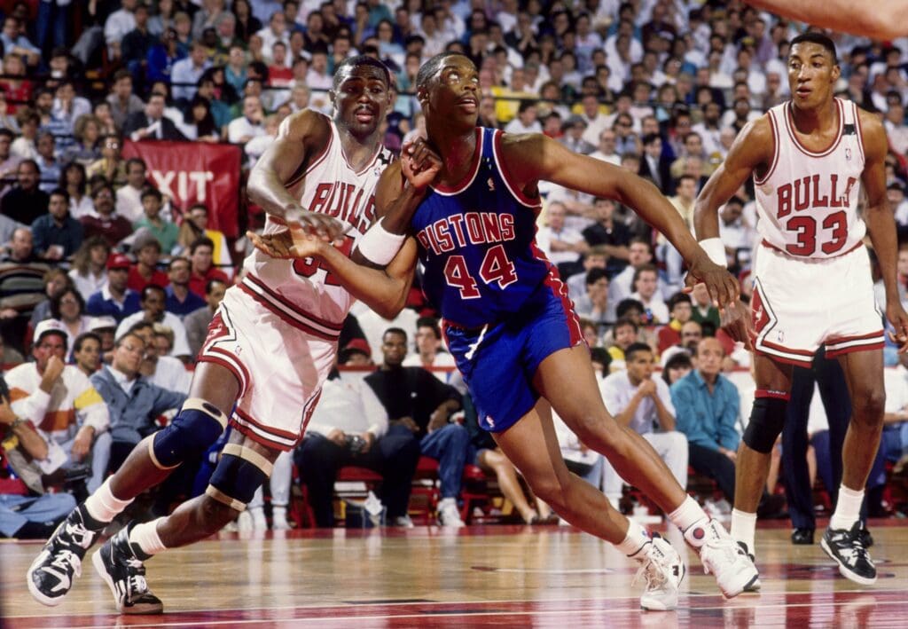 FILE PHOTO; Chicago Bulls forward Horace Grant (54) battles for position against Detroit Pistons forward Rick Mahorn (44) during the 1988-89 NBA Eastern Conference Finals at Chicago Stadium. The Pistons defeated the Bulls 4 games to 2.