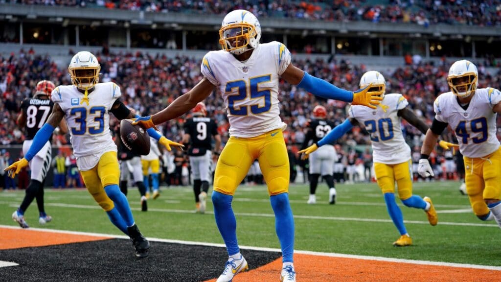 Los Angeles Chargers cornerback Chris Harris (25) celebrates an interception in the fourth quarter during a Week 13 NFL football game against the Cincinnati Bengals, Sunday, Dec. 5, 2021, at Paul Brown Stadium in Cincinnati. The Los Angeles Chargers defeated the Cincinnati Bengals, 41-22. Los Angeles Chargers At Cincinnati Bengals Dec 5