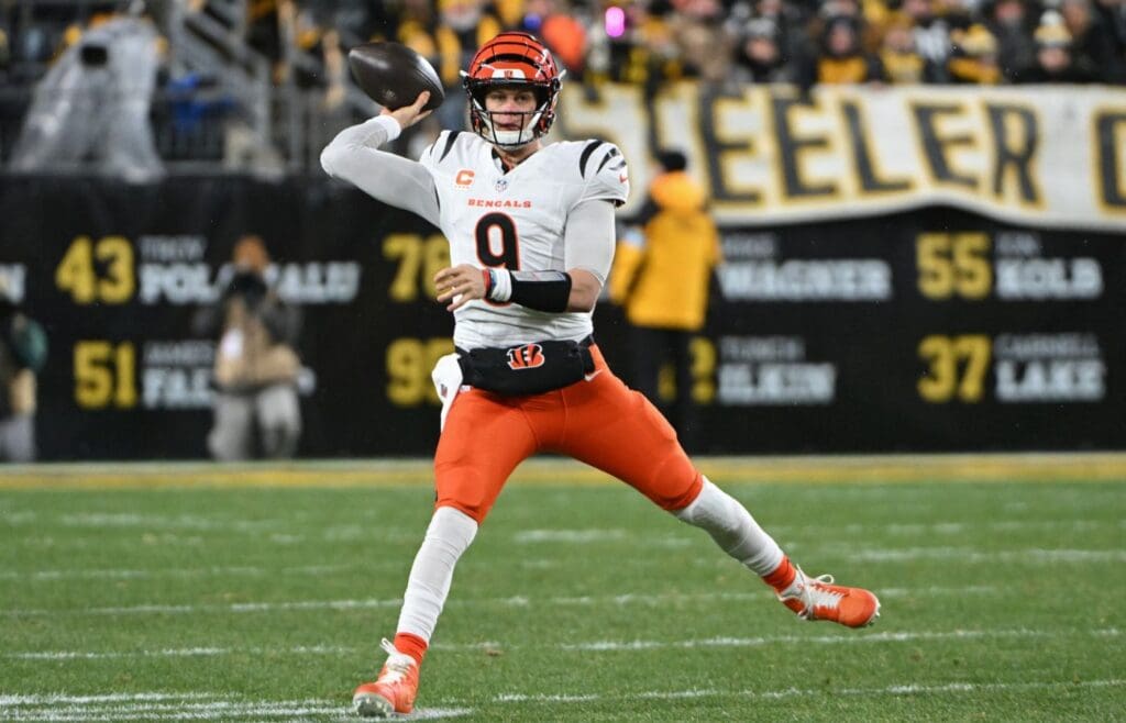 Jan 4, 2025; Pittsburgh, Pennsylvania, USA; Cincinnati Bengals quarterback Joe Burrow (9) throws a pass against the Pittsburgh Steelers during the first quarter at Acrisure Stadium.