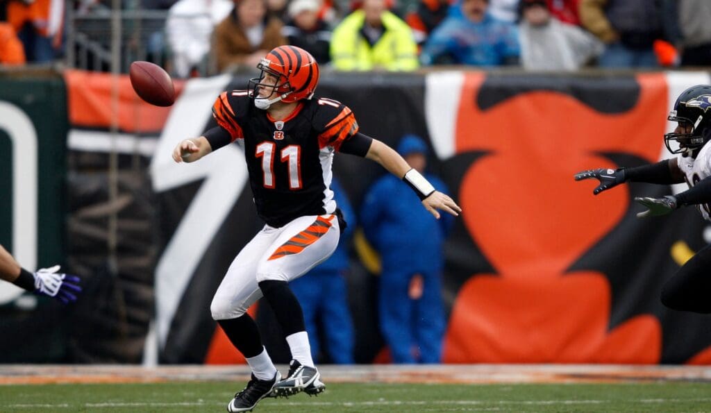 Nov 30, 2008; Cincinnati, OH, USA; Cincinnati Bengals quarterback Ryan Fitzpatrick (11) tries to recover a slipped pass in the first half against Baltimore Ravens at Paul Brown Stadium in Cincinnati, OH. The Ravens won 34-3.
