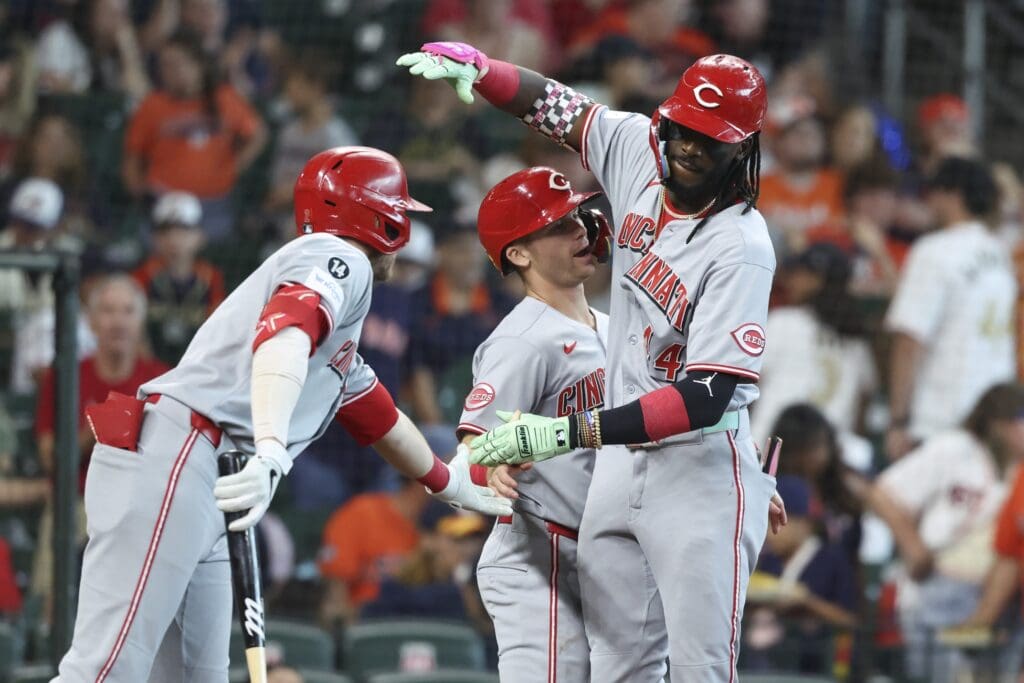May 10, 2025; Houston, Texas, USA; Cincinnati Reds shortstop Elly De La Cruz (44) celebrates with second baseman Matt McLain (9) and designated hitter Gavin Lux (2) after hitting a home run during the first inning against the Houston Astros at Daikin Park