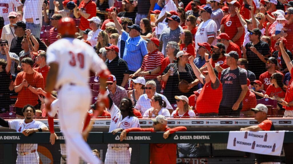 May 18, 2025; Cincinnati, Ohio, USA; Fans react after Cincinnati Reds outfielder Will Benson (30) hits a two-run home run in the fourth inning against the Cleveland Guardians at Great American Ball Park.