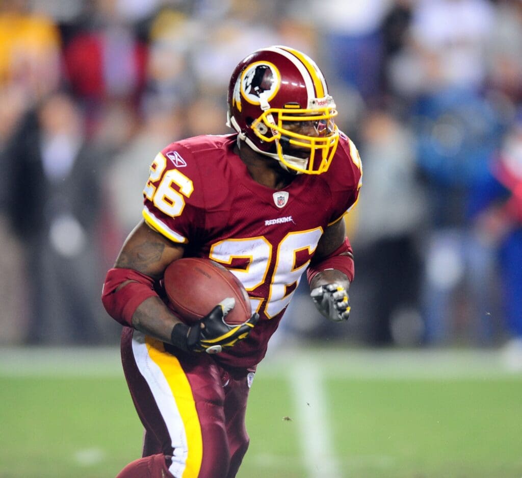 Nov 3, 2008; Landover, MD, USA; Washington Redskins running back Clinton Portis (26) carries the ball against the Pittsburgh Steelers at FedEx Field.