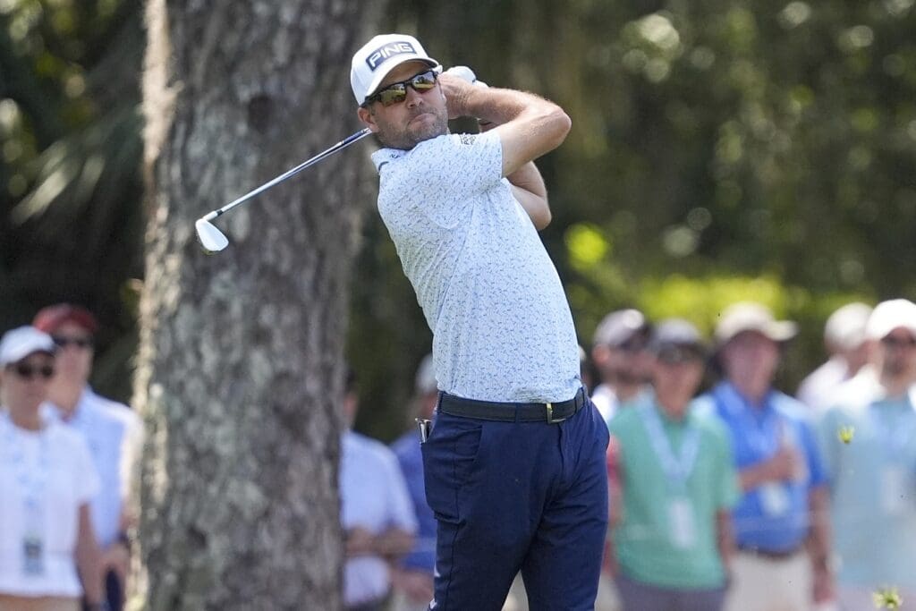 Apr 17, 2025; Hilton Head, South Carolina, USA; Corey Conners hits his second shot on eight during the first round of the RBC Heritage golf tournament.