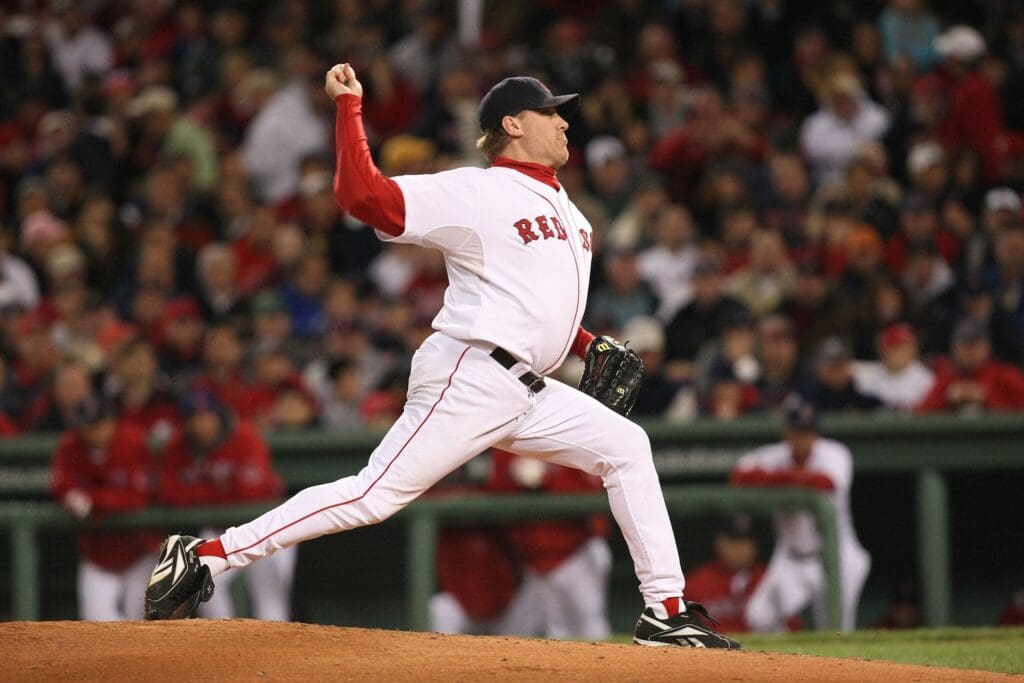 Oct 25, 2007; Boston, MA, USA; Boston Red Sox starting pitcher (38) Curt Schilling delivers a pitch against the Colorado Rockies during game 2 of the 2007 World Series at Fenway Park