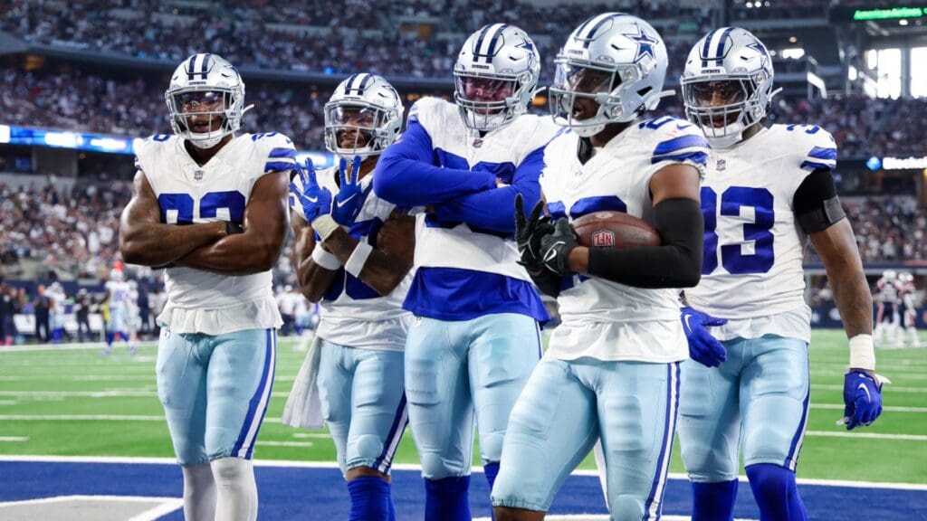Oct 1, 2023; Arlington, Texas, USA; Dallas Cowboys cornerback DaRon Bland (26) celebrates with teammates after intercepting a pass during the second half against the New England Patriots at AT&T Stadium