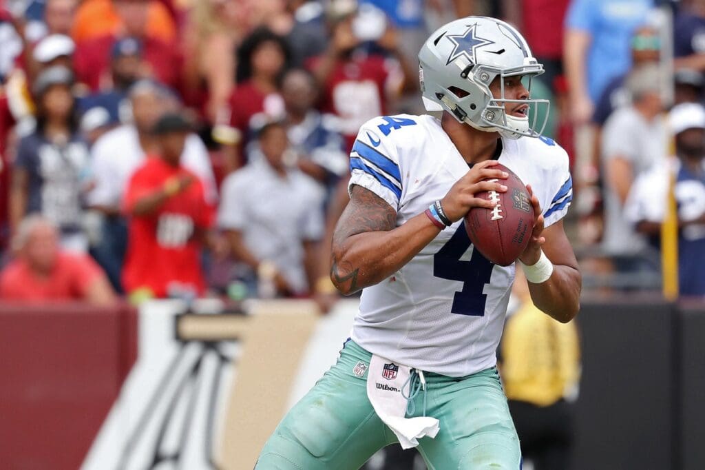 Sep 18, 2016; Landover, MD, USA; Dallas Cowboys quarterback Dak Prescott (4) prepares to pass the ball against the Washington Redskins at FedEx Field.