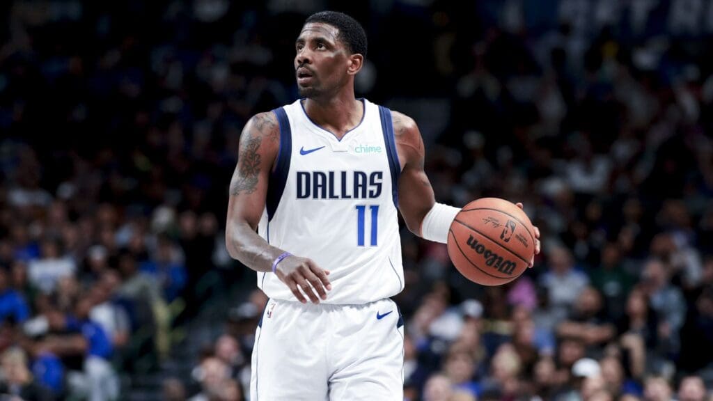 Feb 27, 2025; Dallas, Texas, USA; Dallas Mavericks guard Kyrie Irving (11) controls the ball against the Charlotte Hornets during the second half at American Airlines Center