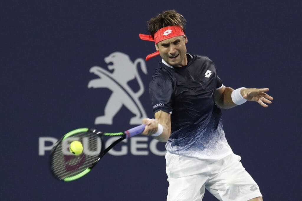 Mar 25, 2019; Miami Gardens, FL, USA; David Ferrer of Spain hits a forehand against Frances Tiafoe of the United States (not pictured) in the third round of the Miami Open at Miami Open Tennis Complex. Mandatory Credit: Geoff Burke-USA TODAY Sports