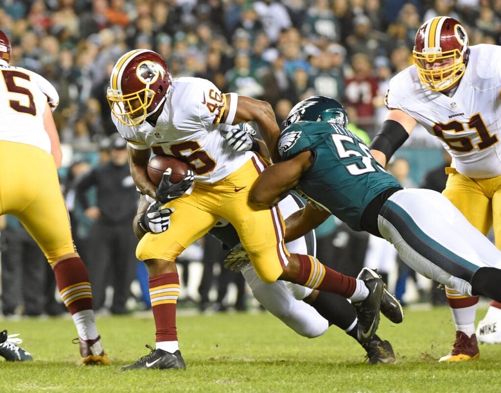 Dec 26, 2015; Philadelphia, PA, USA; Washington Redskins running back Alfred Morris (46) gains yards against Philadelphia Eagles inside linebacker DeMeco Ryans (59) at Lincoln Financial Field. The Redskins defeated the Eagles, 38-24. Mandatory Credit: Eric Hartline-USA TODAY Sports
