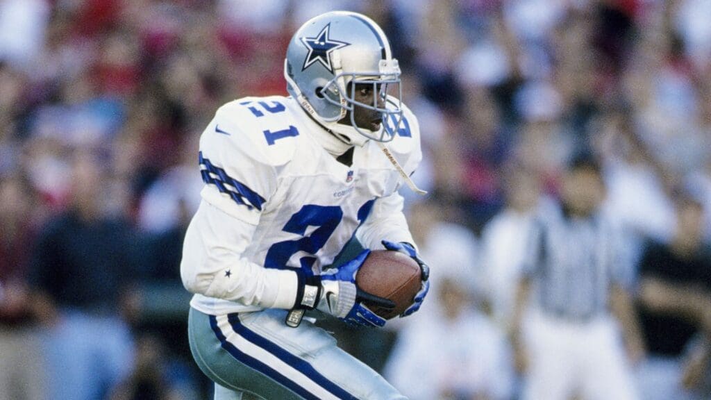 Nov 2, 1997; San Francisco, CA, USA; FILE PHOTO; Dallas Cowboys punt returner Deion Sanders (21) runs with the ball against the San Francisco 49ers at Candlestick Park.