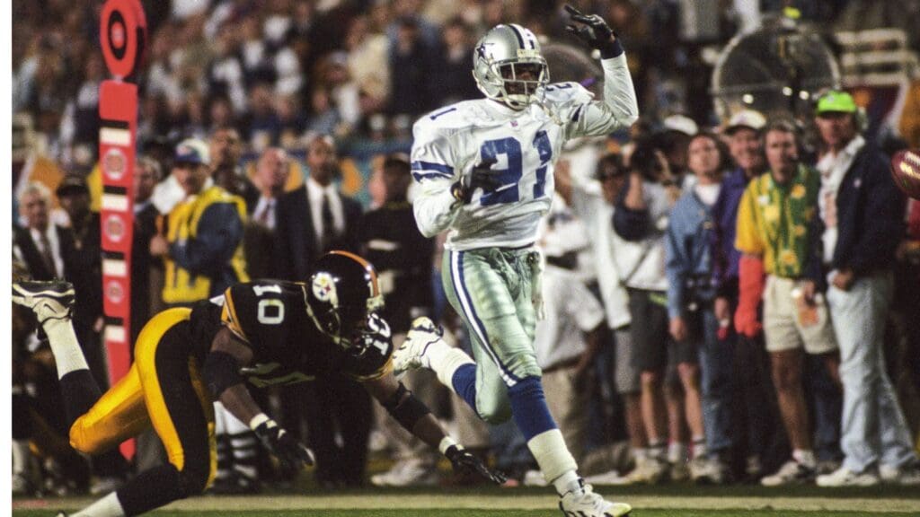 Jan 28, 1996; Tempe, AZ, USA; FILE PHOTO; Dallas Cowboys cornerback Deion Sanders (21) in action against Pittsburgh Steelers quarterback Kordell Stewart (10) during Super Bowl XXX at Sun Devil Stadium. The Cowboys defeated the Steelers 27-17.