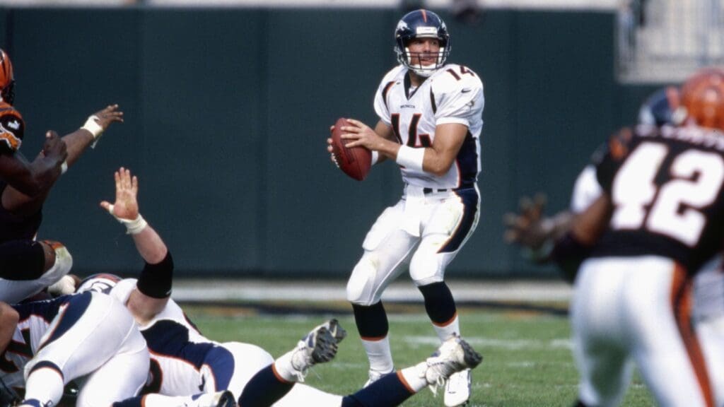 Oct 22, 2000; Cincinnati, OH, USA; Denver Broncos quarterback Brian Griese (14) throws in the pocket against the Cincinnati Bengals at Paul Brown Stadium.