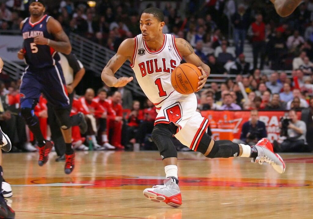 Mar 11, 2011; Chicago, IL, USA; Chicago Bulls point guard Derrick Rose (1) with the ball in the second half against the Atlanta Hawks at the United Center. The Bulls defeated the Hawks 94-76.
