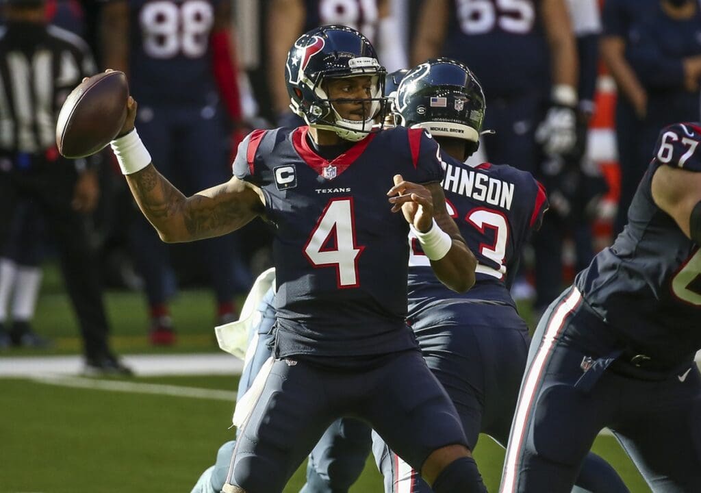 Jan 3, 2021; Houston, Texas, USA; Houston Texans quarterback Deshaun Watson (4) throws a pass against the Tennessee Titans during the first quarter at NRG Stadium.