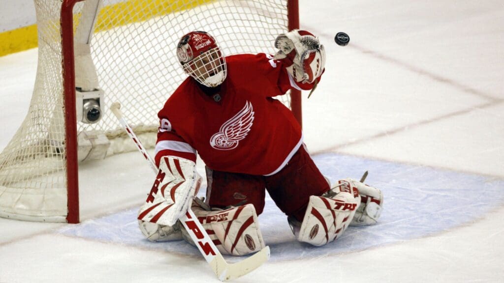 April 6, 2008; Detroit, MI, USA; Detroit Red Wings goalie Dominik Hasek (39) makes the stop during the first period of the game against the Chicago Black Hawks at Joe Louis Arena.