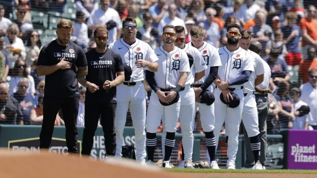 May 26, 2025; Detroit, Michigan, USA; Detroit Tigers plssyers stand during the national anthem before the game dsbetween the Detroit Tigers and the San Francisco Giants at Comerica Park