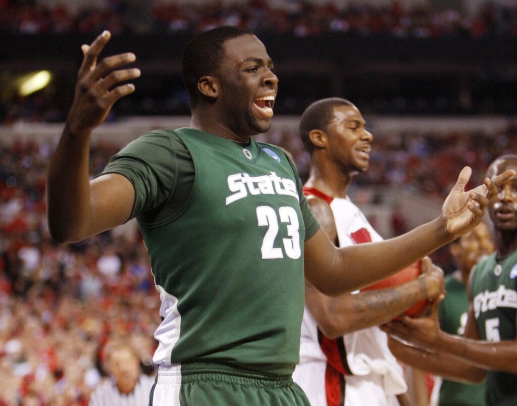 Mar 29, 2009; Indianapolis, IN, USA; Michigan State Spartans forward Draymond Green (23) reacts during the first half of the finals of the midwest region of the 2009 NCAA mens basketball tournament against the Louisville Cardinals at Lucas Oil Stadium.