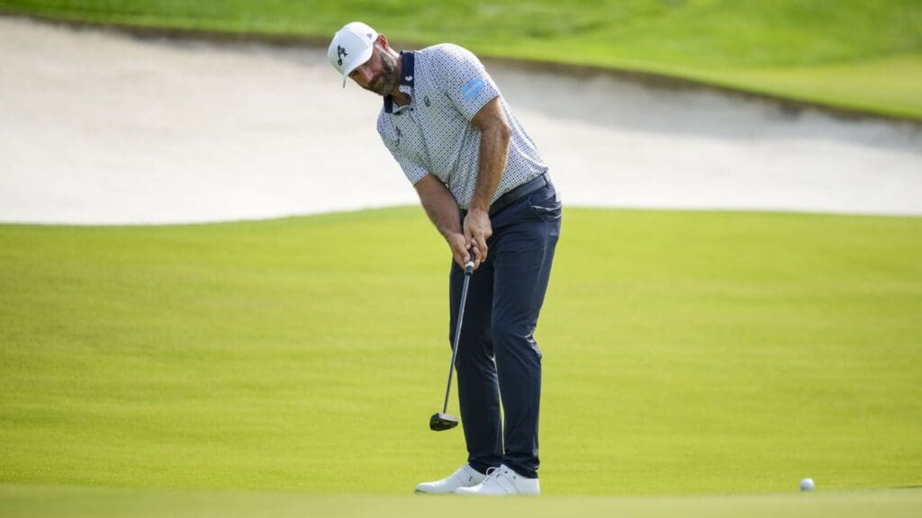 May 16, 2025; Charlotte, North Carolina, USA; Dustin Johnson putt on the fifteenth hole during the second round of the PGA Championship golf tournament at Quail Hollow.