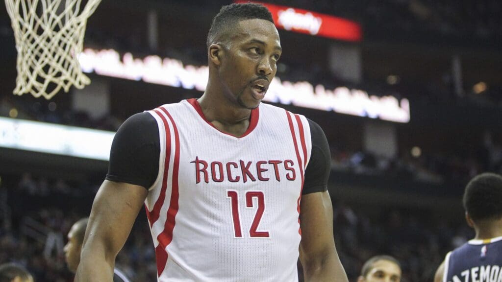 Dec 20, 2014; Houston, TX, USA; Houston Rockets center Dwight Howard (12) reacts after a play during the fourth quarter against the Atlanta Hawks at Toyota Center. The Hawks defeated the Rockets 104-97.