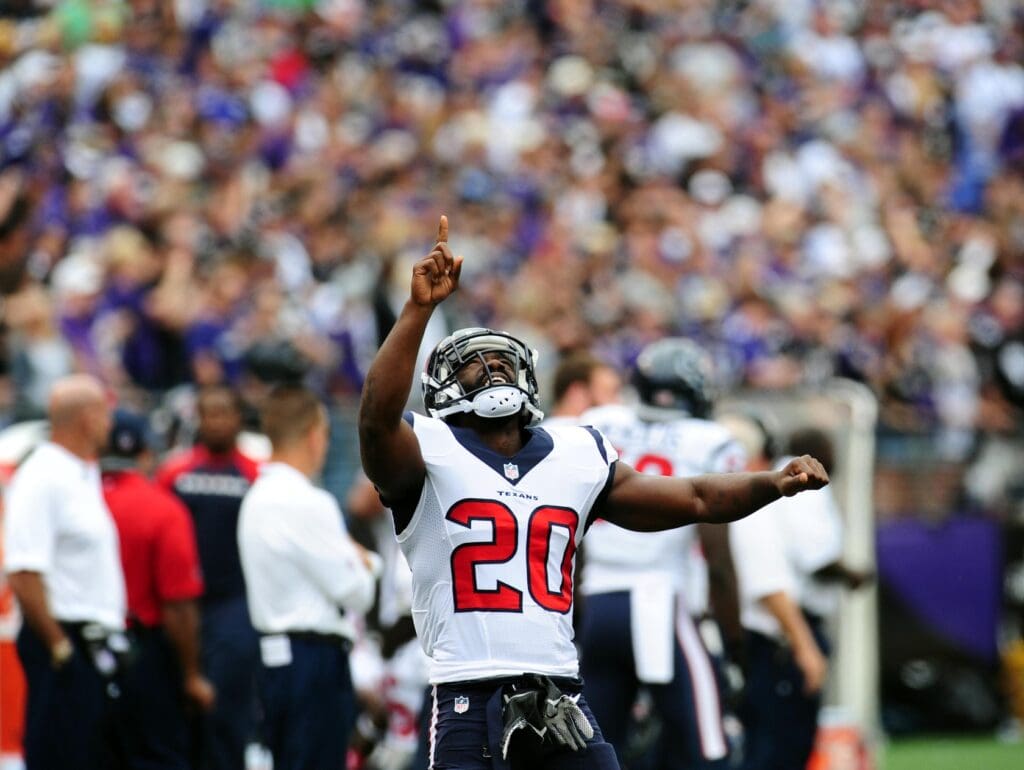 Sep 22, 2013; Baltimore, MD, USA; Houston Texans safety Ed Reed (20) points to the sky prior to the game against the Baltimore Ravens at M&T Bank Stadium.