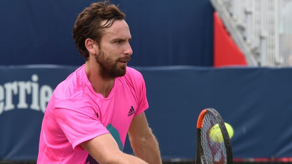Aug 4, 2018; Toronto, Ontario, Canada; Ernests Gulbis of Latvia hits a shot against Ryan Harrison of the USA (not shown) in the Rogers Cup tennis tournament at Aviva Centre.