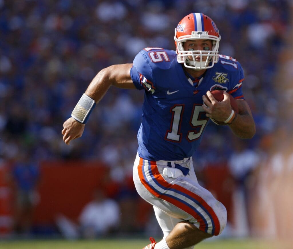 Sep 15, 2007; Gainesville, FL, USA; Florida Gators quarterback Tim Tebow (15) runs against the Tennessee Volunteers during the second quarter at Ben Hill Griffin Stadium in Gainesville, FL. Florida won the game 59-20.