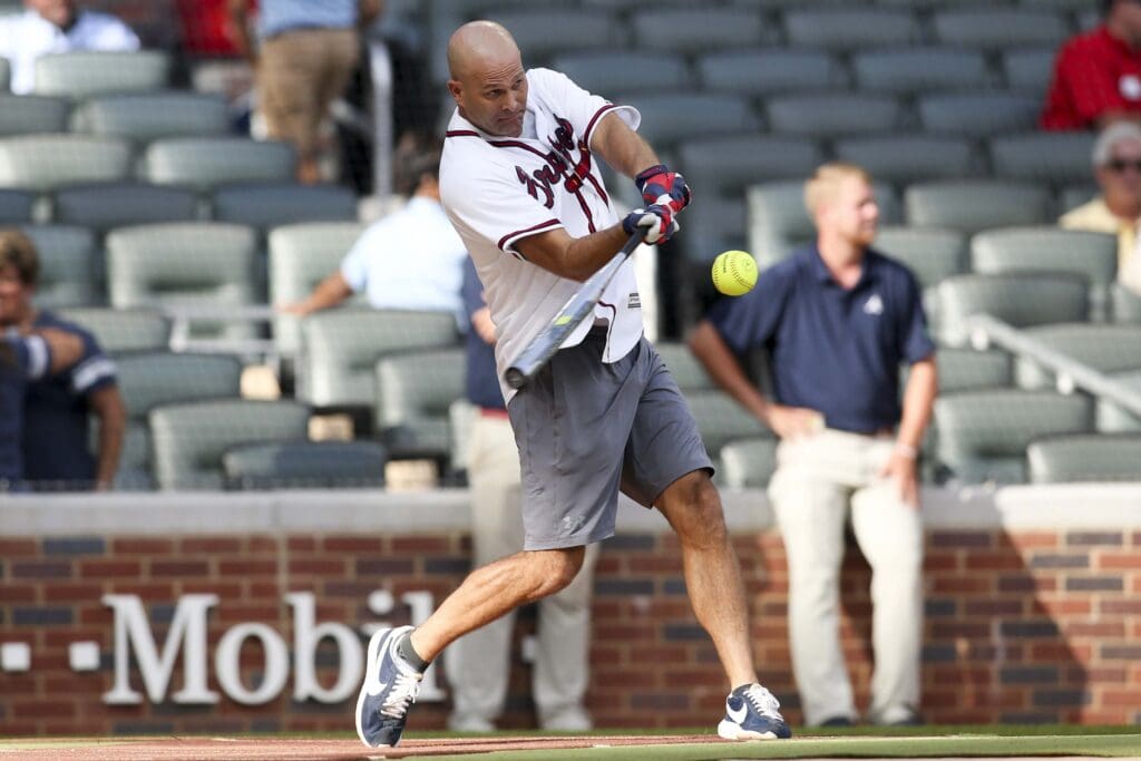 Aug 11, 2018; Atlanta, GA, USA; Former Atlanta Braves starting pitcher Tim Hudson (15) hits at the Alumni Softball Home Run Derby before a game against the Milwaukee Brewers at SunTrust Park.
