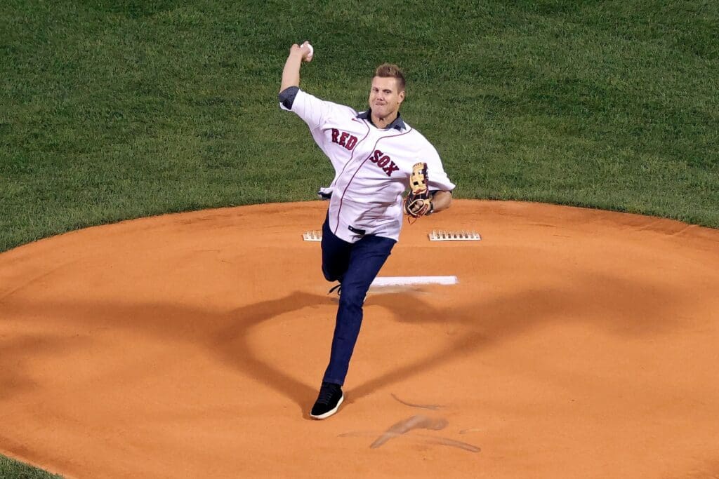 Former Boston Red Sox pitcher Jonathan Papelbon throws a ceremonial first pitch before game three of the 2021 ALCS against the Houston Astros at Fenway Park.