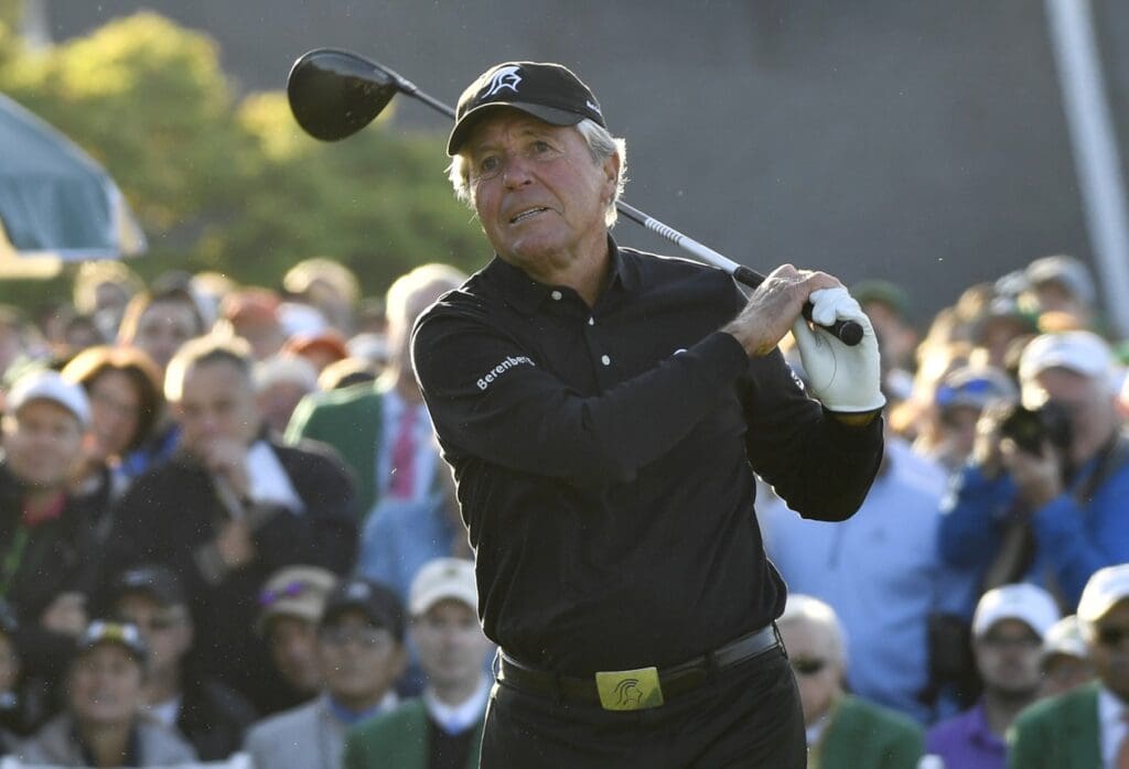 Apr 5, 2018; Augusta, GA, USA; Gary Player hits a ceremonial tee shot on the 1st hole during the first round of the Masters golf tournament at Augusta National GC.