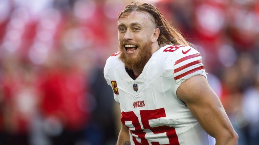 Jan 5, 2025; Glendale, Arizona, USA; San Francisco 49ers tight end George Kittle (85) against the Arizona Cardinals at State Farm Stadium.