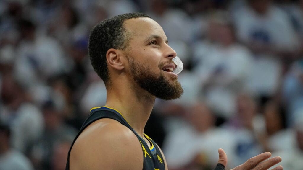 May 6, 2025; Minneapolis, Minnesota, USA; Golden State Warriors guard Stephen Curry (30) prepares to play the Minnesota Timberwolves before game one of the second round for the 2025 NBA Playoffs at Target Center.