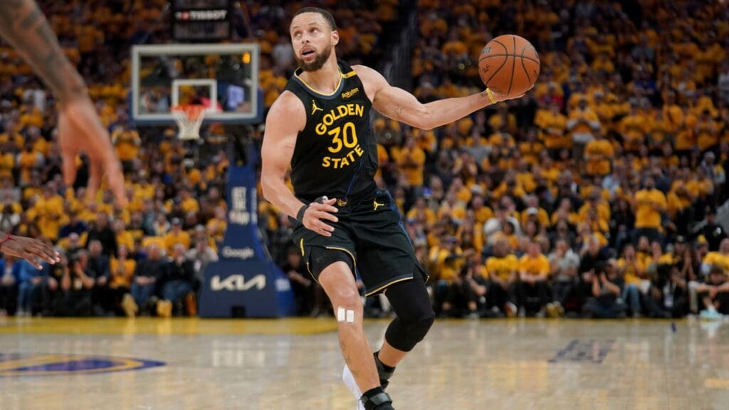 May 2, 2025; San Francisco, California, USA; Golden State Warriors guard Stephen Curry (30) holds onto the ball against the Houston Rockets in the third quarter of game six of the first round for the 2025 NBA Playoffs at Chase Center