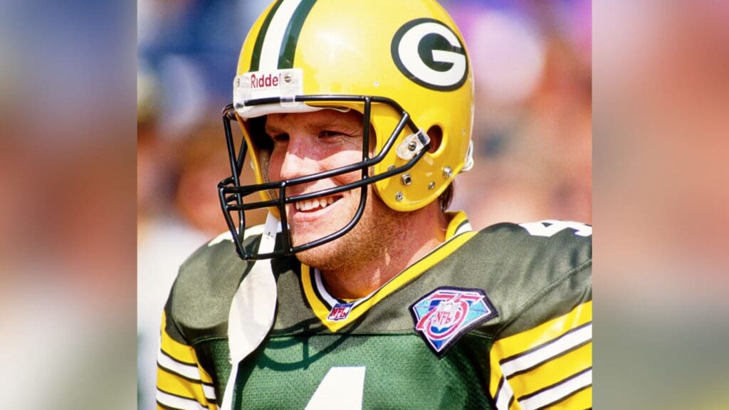 Sep 11, 1994; Green Bay, WI, USA; FILE PHOTO; Green Bay Packers quarterback Brett Favre (4) on the sidelines against the Miami Dolphins at Lambeau Field.