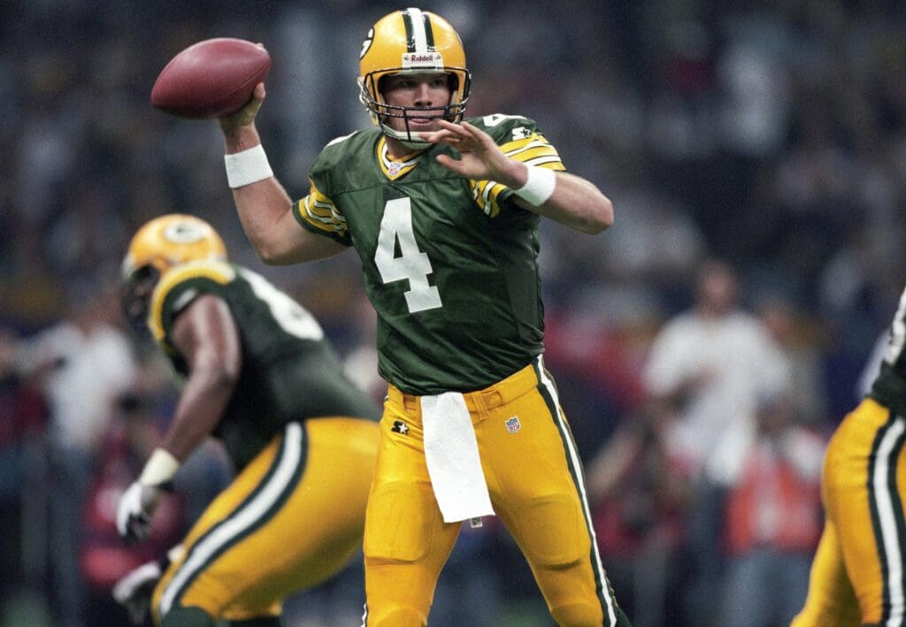 Jan 26, 1997; New Orleans, LA, USA; FILE PHOTO; Green Bay Packers quarterback Brett Favre (4) in action against the New England Patriots during Super Bowl XXXI at the Superdome. The Packers defeated the Patriots 35-21.