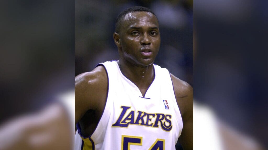 Dec 25, 2003; Los Angeles, CA, USA; Los Angeles Lakers forward Horace Grant (54) reacts during the game against the Houston Rockets at the Staples Center. The Rockets defeated the Lakers 99-87.