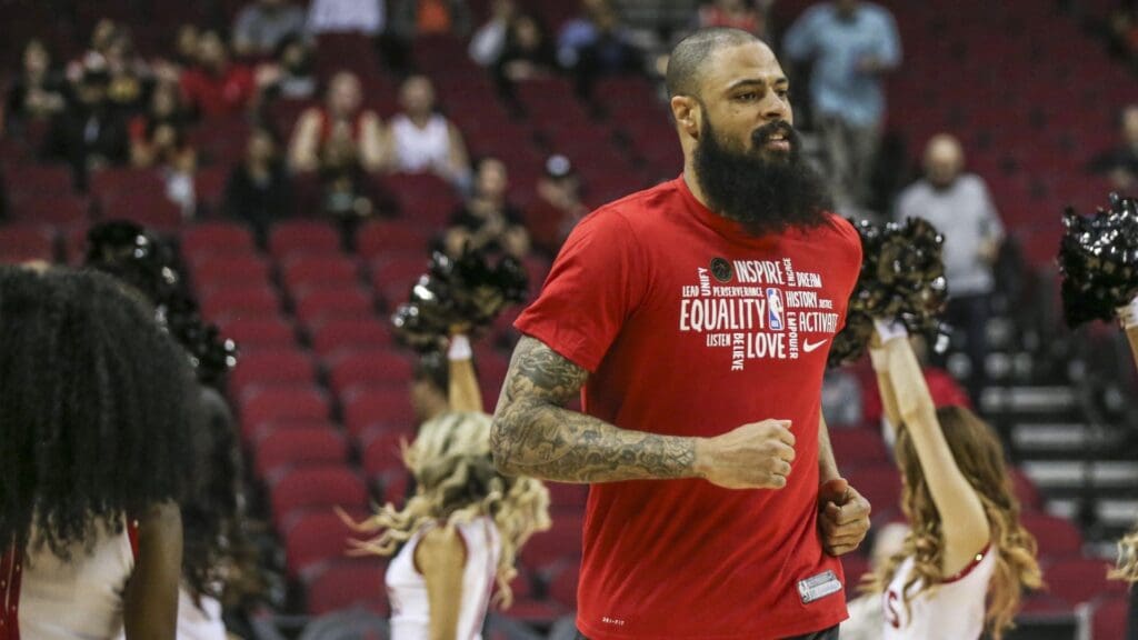 Feb 4, 2020; Houston, Texas, USA; Houston Rockets center Tyson Chandler (19) runs onto the court before playing against the Charlotte Hornets at Toyota Center.