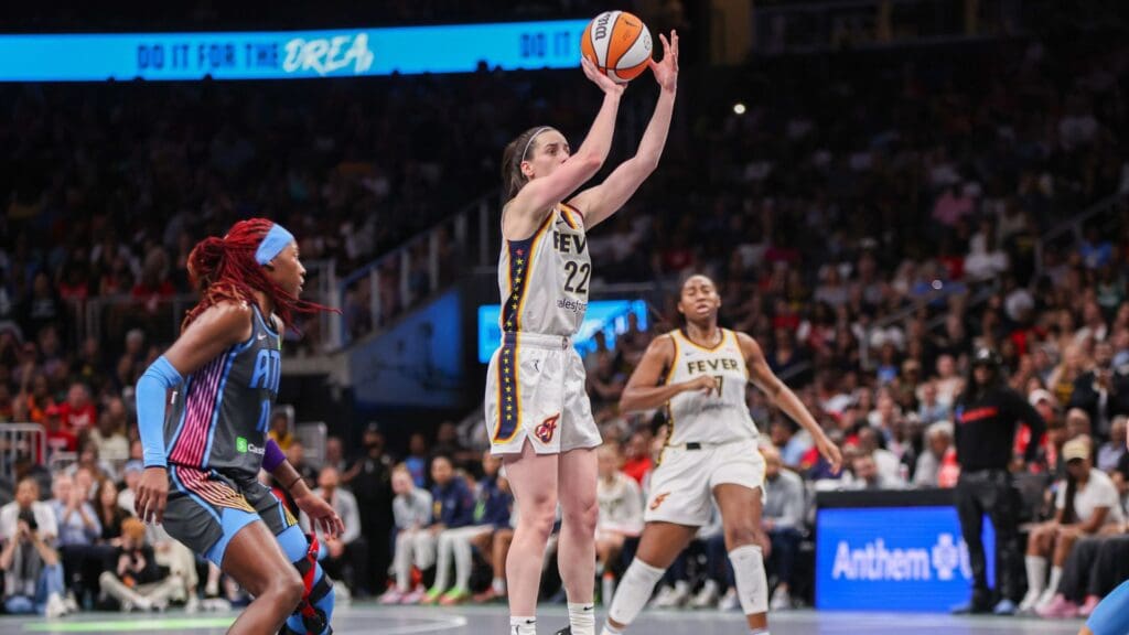 May 22, 2025; Atlanta, Georgia, USA; Indiana Fever guard Caitlin Clark (22) shoots against the Atlanta Dream in the fourth quarter at State Farm Arena