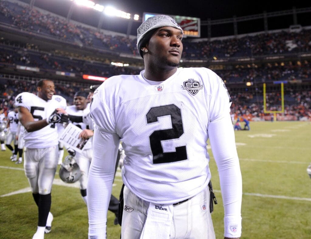 Dec 20, 2009; Denver, CO, USA; Oakland Raiders quarterback JaMarcus Russell (2) walks off the field after the Raiders' 20-19 victory over the Denver Broncos at Invesco Field.