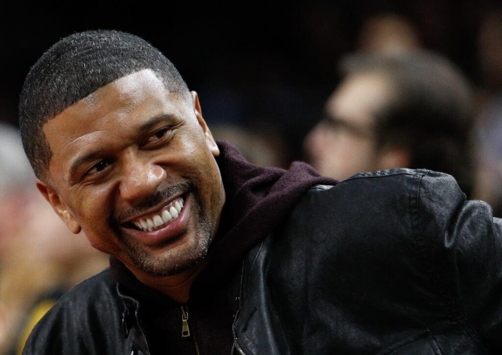 Dec 23, 2016; Auburn Hills, MI, USA; ESPN sports analyst Jalen Rose smiles before the game between the Detroit Pistons and the Golden State Warriors at The Palace of Auburn Hills. Warriors won 119-113.