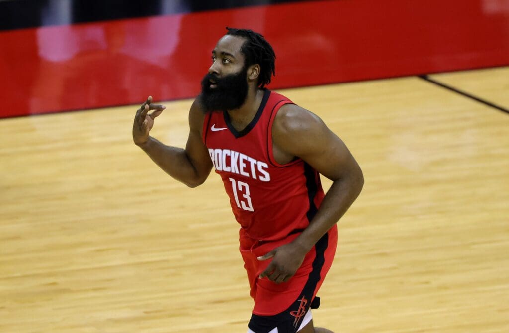 James Harden #13 of the Houston Rockets reacts to a basket during the first quarter of a game against the Los Angeles Lakers at Toyota Center on January 10, 2021 in Houston, Texas.