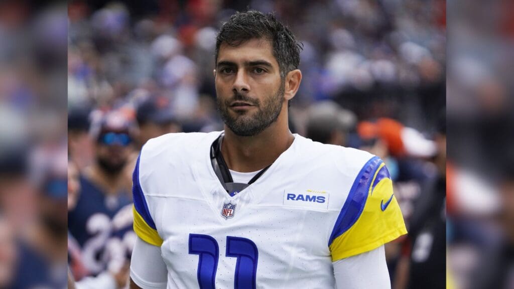 Sep 29, 2024; Chicago, Illinois, USA; Los Angeles Rams quarterback Jimmy Garoppolo (11) in a game against the Chicago Bears at Soldier Field.