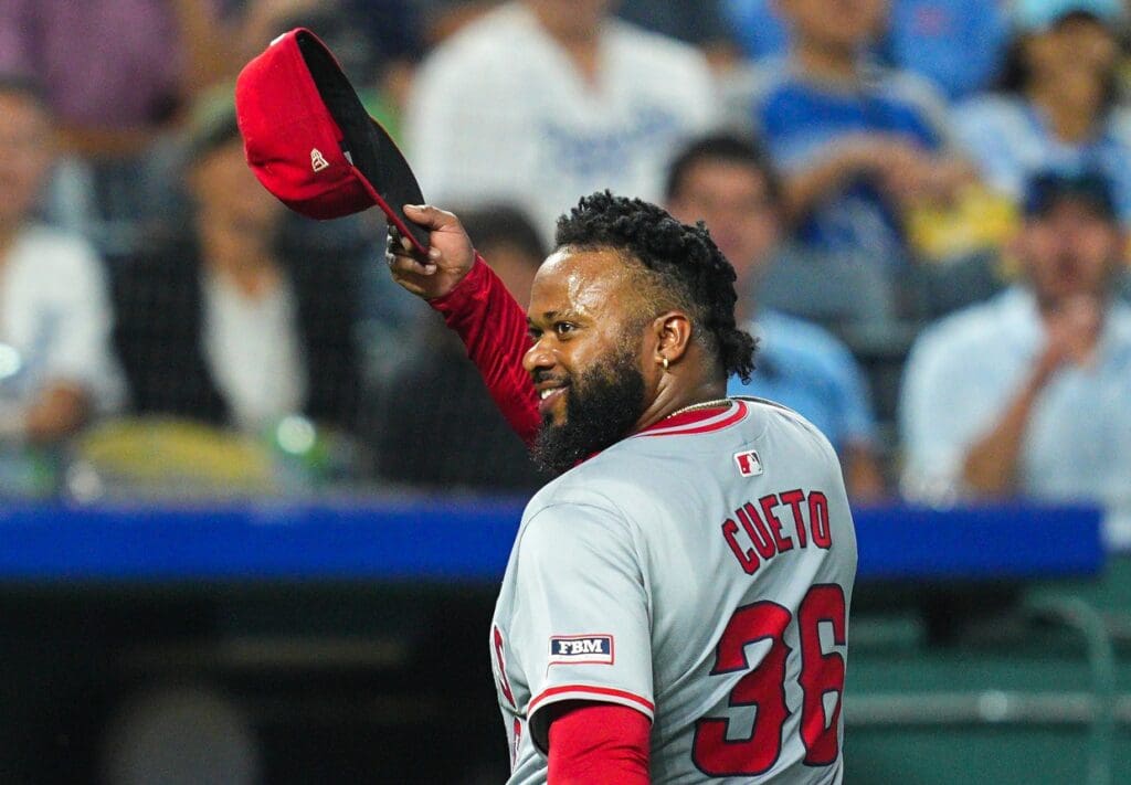 Aug 21, 2024; Kansas City, Missouri, USA; Los Angeles Angels starting pitcher Johnny Cueto (36) tips his cap to the fans as he exits the game during the seventh inning against the Kansas City Royals at Kauffman Stadium.