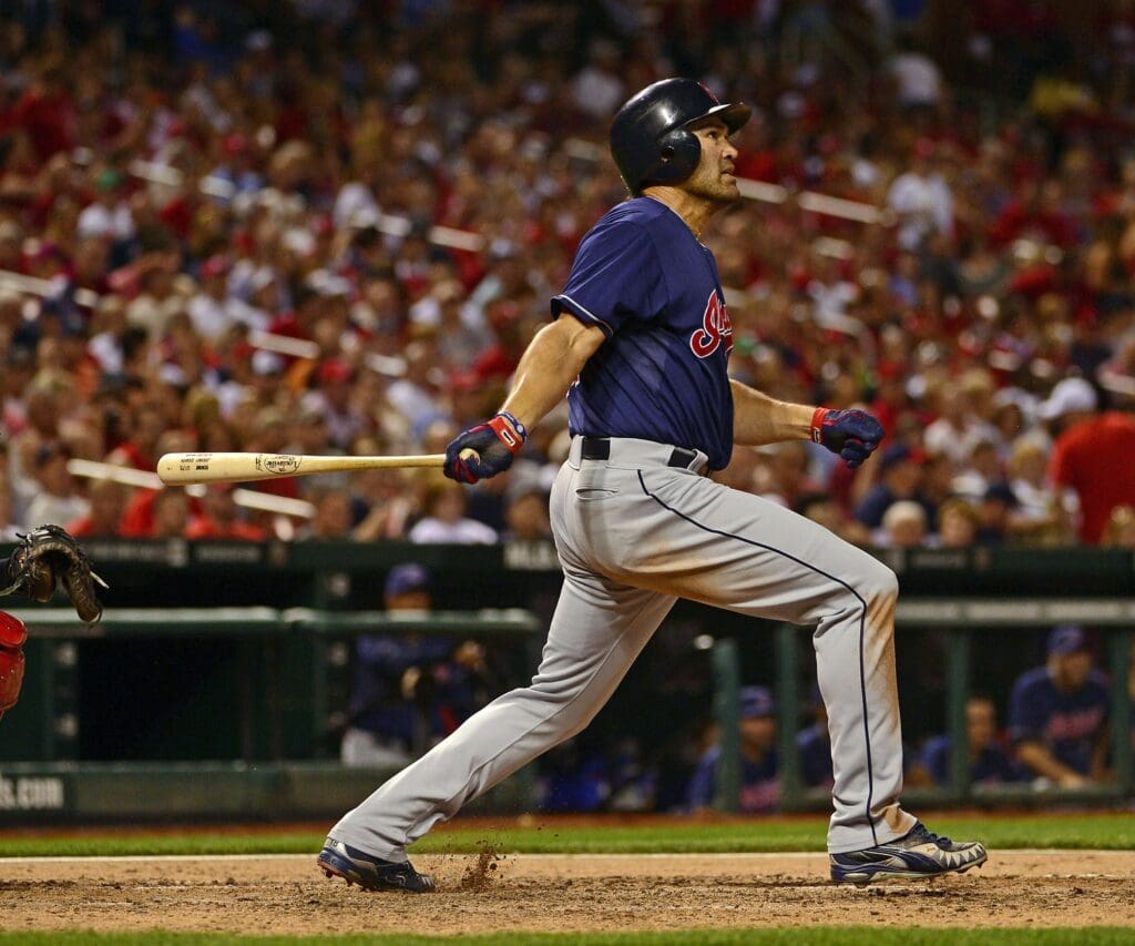 June 8, 2012; St. Louis, MO, USA; Cleveland Indians left fielder Johnny Damon (33) follows through with a 2 run home run against the St. Louis Cardinals at Busch Stadium.