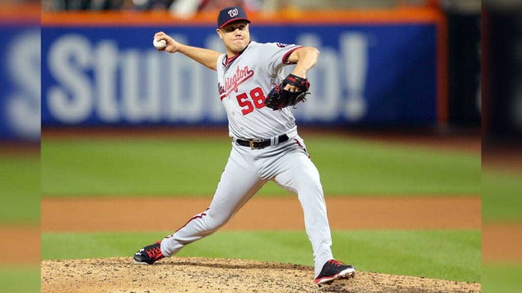 Jul 8, 2016; New York City, NY, USA; Washington Nationals relief pitcher Jonathan Papelbon (58) pitches against the New York Mets during the ninth inning at Citi Field.