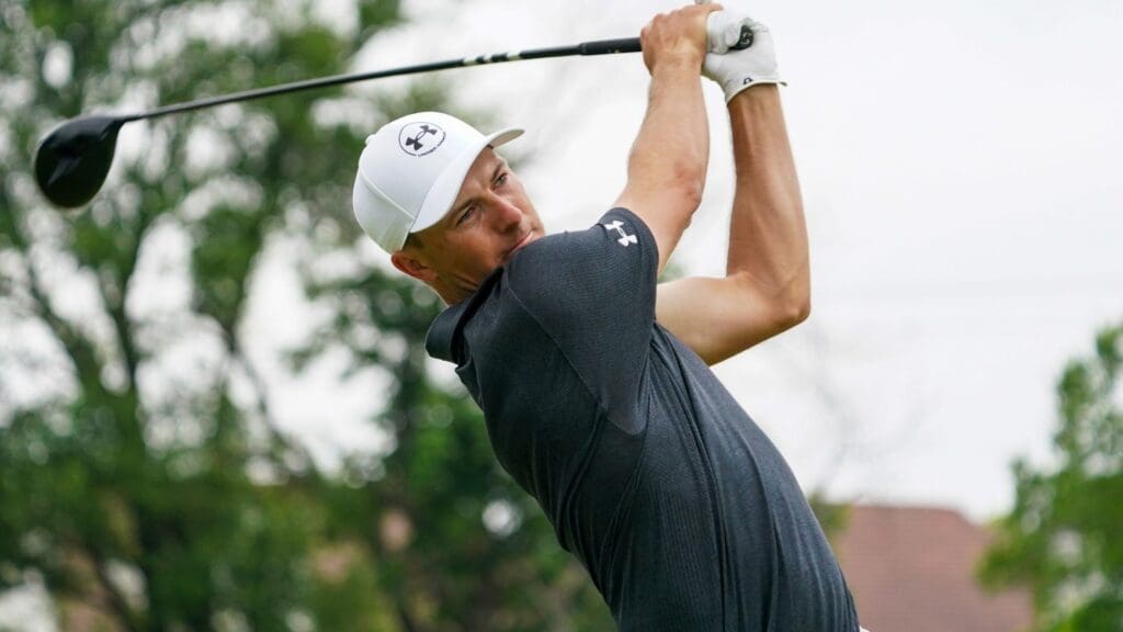 May 24, 2025; Fort Worth, Texas, USA; Jordan Spieth plays his shot from the 11th tee during the third round of the Charles Schwab Challenge golf tournament.
