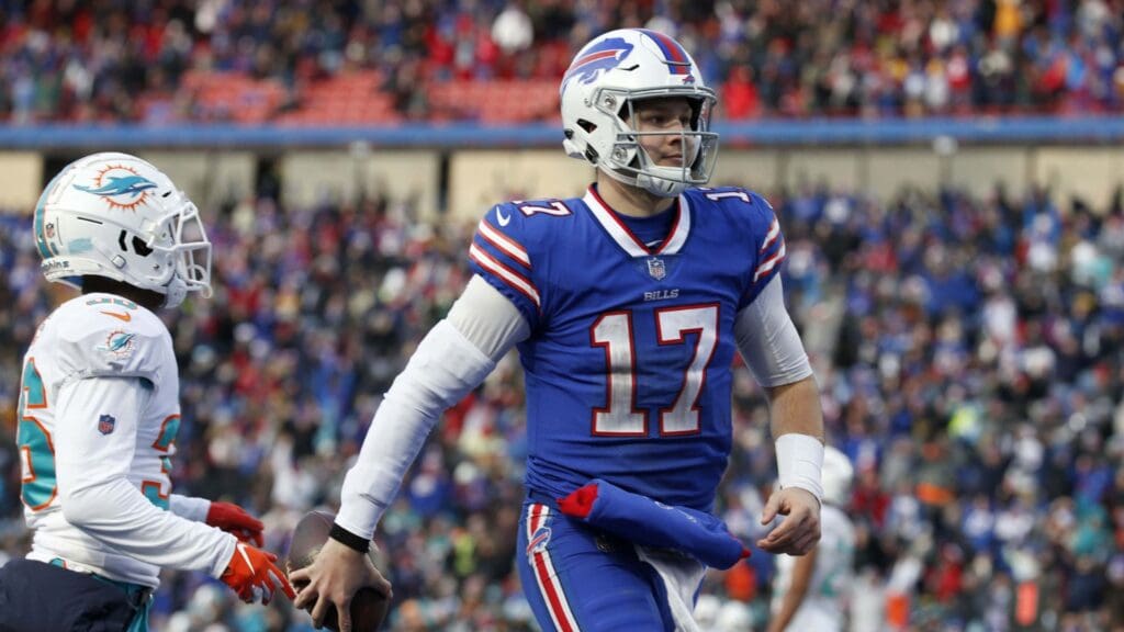 Dec 30, 2018; Orchard Park, NY, USA; Buffalo Bills quarterback Josh Allen (17) runs the ball in for a touchdown during the second half against the Miami Dolphins at New Era Field.