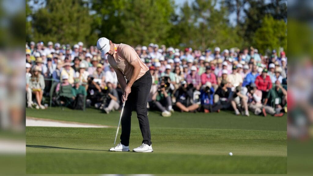 Apr 13, 2025; Augusta, Georgia, USA; Justin Rose putts for a birdie on no. 18 during the final round of the Masters Tournament at Augusta National Golf Club.