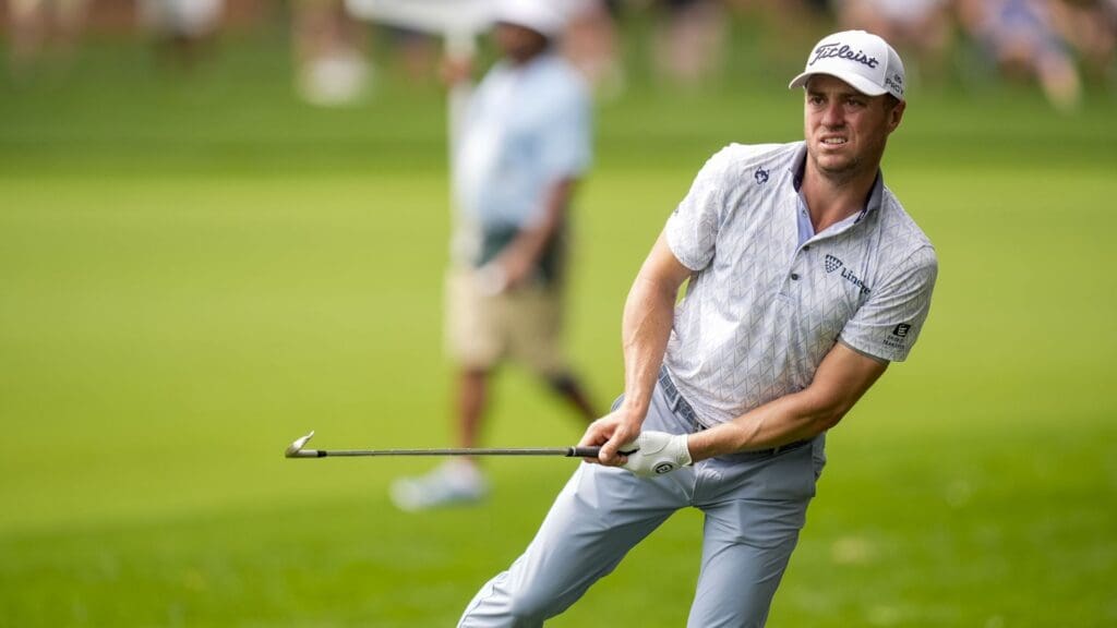 May 16, 2025; Charlotte, North Carolina, USA; Justin Thomas watches his ball travel to the green on the second hole during the second round of the PGA Championship golf tournament at Quail Hollow.