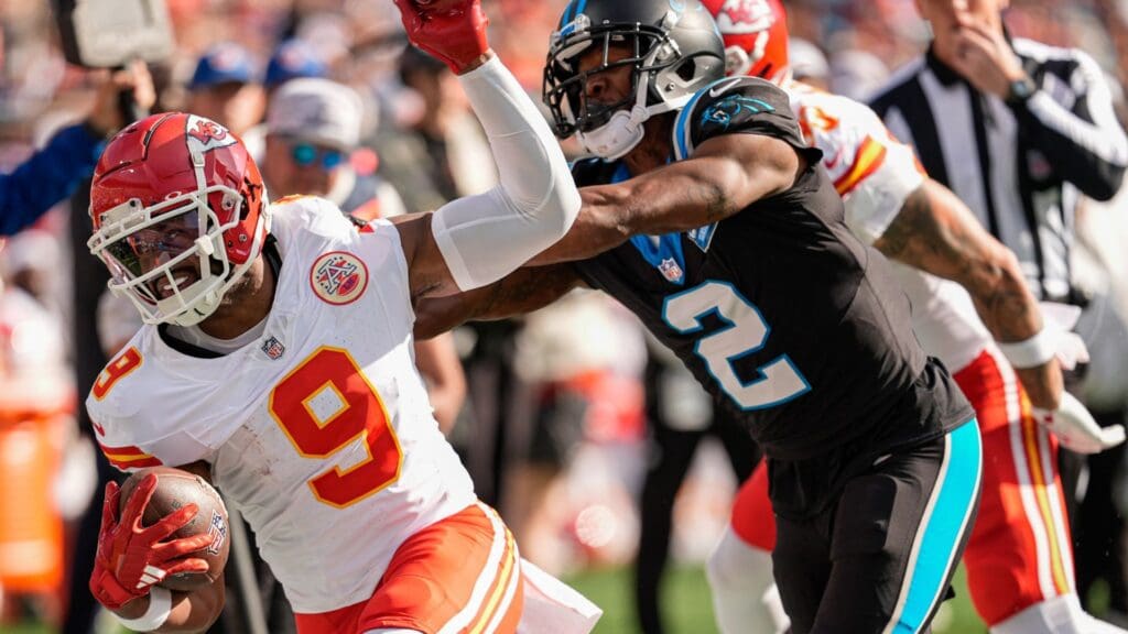 Nov 24, 2024; Charlotte, North Carolina, USA; Kansas City Chiefs wide receiver JuJu Smith-Schuster (9) is forced out of bounds by Carolina Panthers cornerback Michael Jackson (2) during the first quarter at Bank of America Stadium.